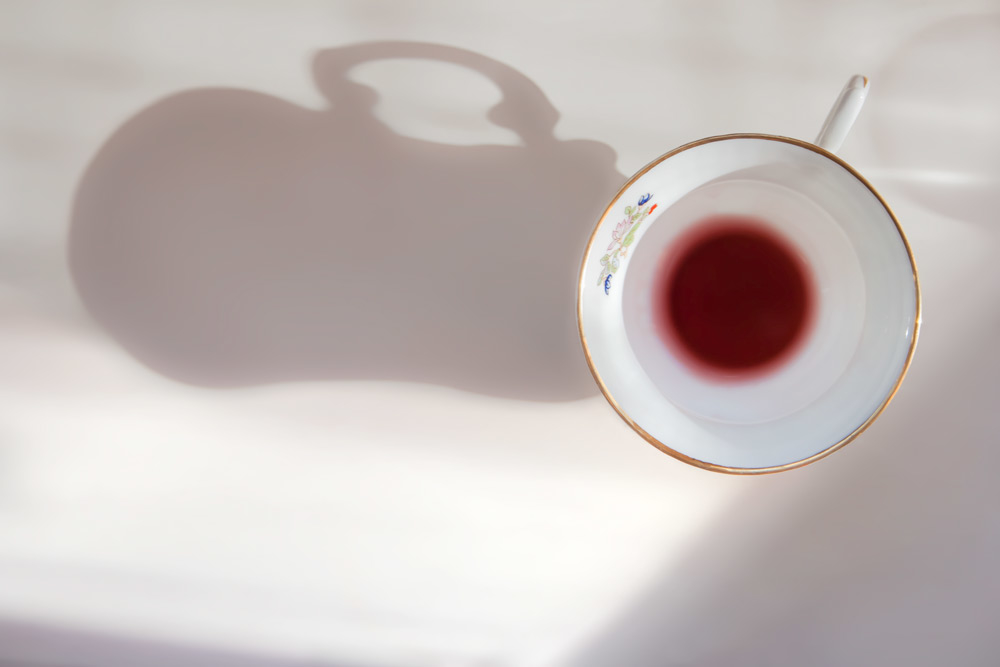 Red wine on a teacup
